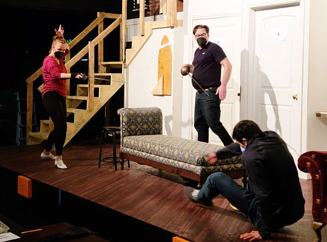 From left, actors Laurie Dawn, Brik Berkes and Samuel Wick rehearse for “Moon Over Buffalo.” Rick Robinson photo