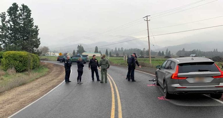 Investigators survey the scene of a fatal collision Monday on Wagner Creek Road in Talent. Jackson County Sheriff's Office photo