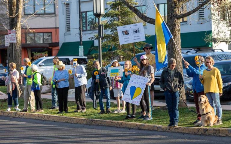Dozens of people, many dressed in blue and yellow, the colors of the Ukrainian flag, lined Main Street by Ashland Plaza Thursday, showing support for the eastern European country. Bob Palermini photo/palermini.com