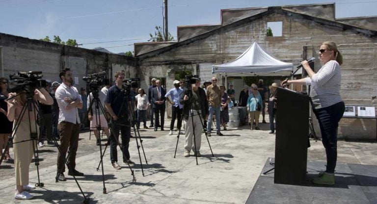 Talent Mayor Darby Ayers-Flood explained Talent’s urban renewal plan at an event at Malmgren Garage, which is being restored with technical assistance from the Talent Urban Renewal Agency. Matt Witt Photography