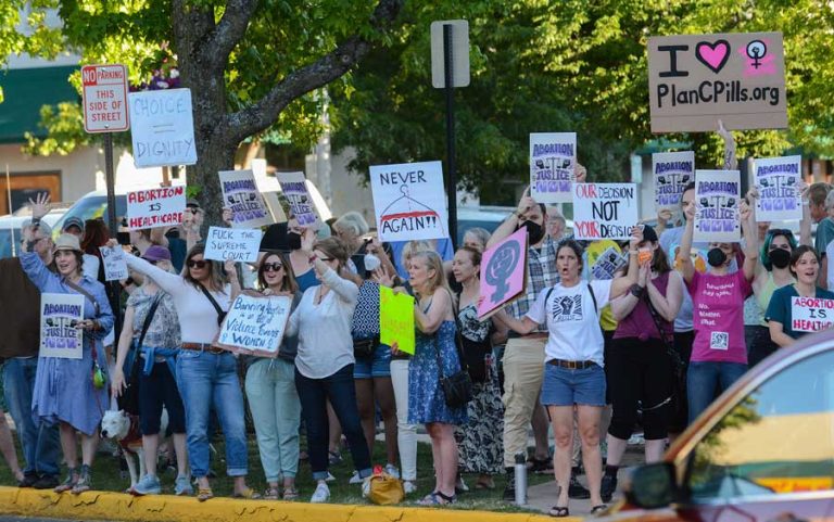 Demonstrators line East Main Street at a rally on the Ashland Plaza on Friday. Drew Fleming photo for Ashland.news