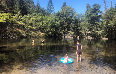 People cool off in the Ashland Swim Reservoir in 2019. Ashland Parks & Recreation photo