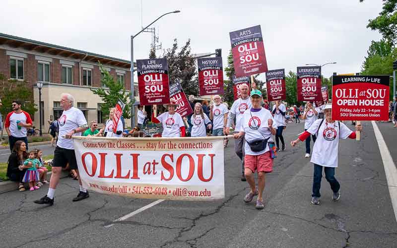 OLLI at SOU members march past the fire station in the Ashland 4th of July parade. Bob Palermini photo/palermini.com