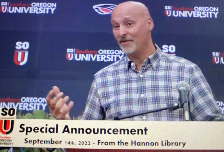 Bryan DeBoer, seen here via a video feed, speaks during Wednesday's announcement of his planned donation of $12 million over 10 years to Southern Oregon University for a variety of uses, including scholarships and the foundation of a new institute.
