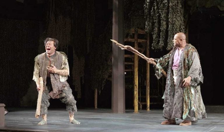 James Ryen as Caliban, left, and Kevin Kenerly as Prospero share a dramatic moment in an early production of 2022's "The Tempest" by William Shakespeare at the Allen Elizabethan Theatre. OSF will shorten its season in 2023. Jenny Graham photo