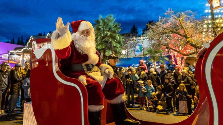 Santa waves to the crowd on the way to the Ashland Plaza in 2022. Bob Palermini photo/palermini.com