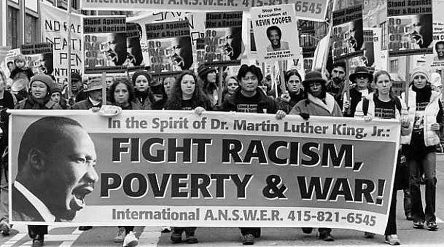 Martin Luther King Jr. publicly opposes the Vietnam War at a mass rally at the Ninth Annual Convention of SCLC in Birmingham. Photo via dtc-wsuv.org