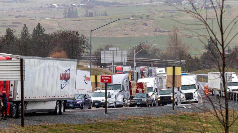 Trucks backup on the southbound offramp at Exit 14 in Ashland due to a weather-related I-5 closure Tuesday morning. Bob Palermini photo/@bobpal