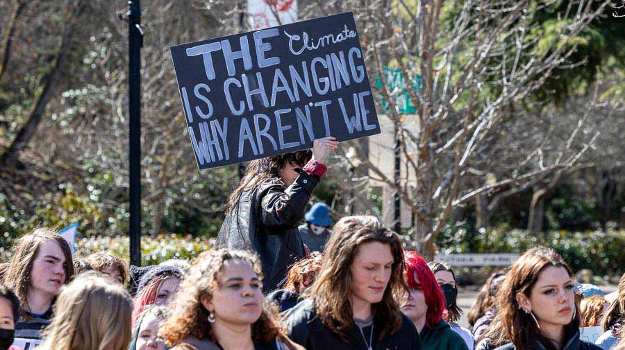 Students display signs demanding action on climate change on the Ashland Plaza in March 2023. Bob Palermini photo/palermini.com