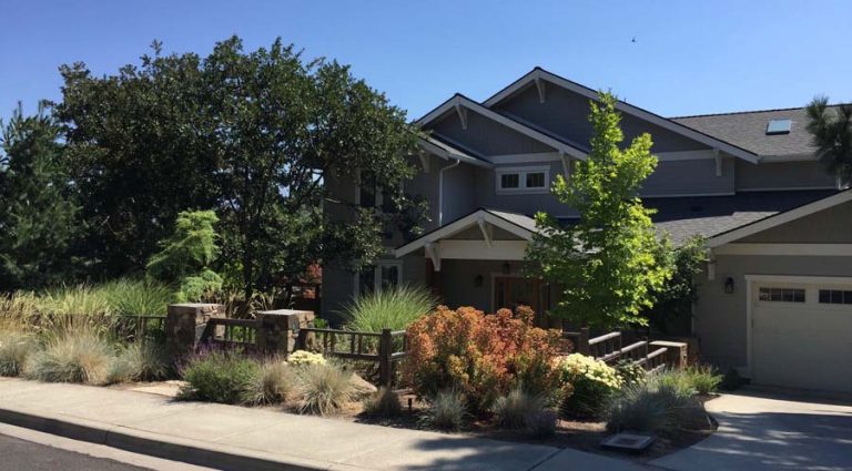 Alicia and Jeffrey Welder worked with Regenesis Ecological Design and designer Jane Alexanderr to create a beautiful garden where their children can play and explore. Ruth Sloan photo August Garden of the Month