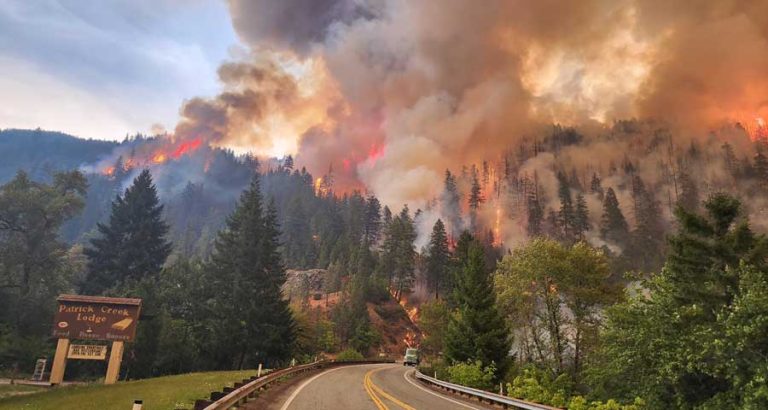 The Smith River Complex fire burns on the north side of Highway 199, the Redwood Highway, near Patrick Creek Lodge north of Gasquet in this image posted Thursday on the Inciweb site. Bill Steven photo