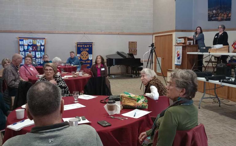 Ashland Mayor Tonya Graham, in gray jacket at microphone, listens to a question from the audience at a meeting of the Rotary Club of Ashland on Thursday in Wesley Hall at the First United Methodist Church. Ashland.news photo by Morgan Rothborne