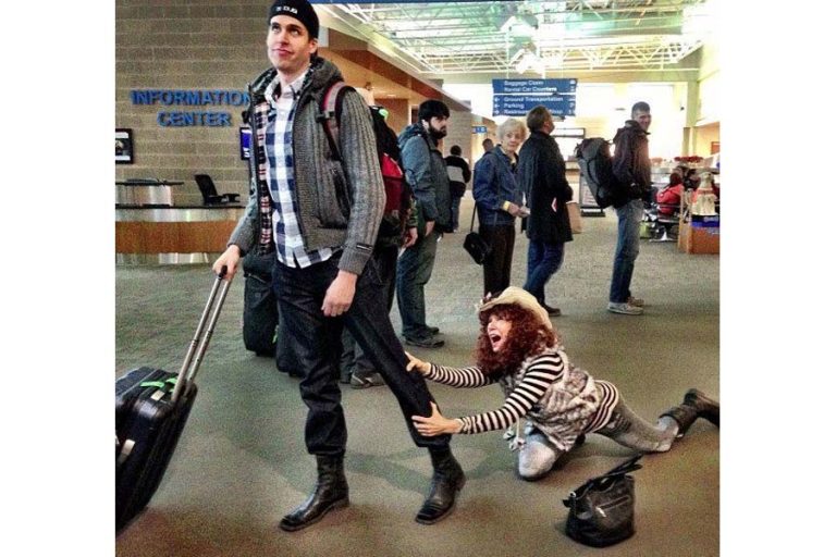 Janai Mestrovich expresses her feelings as her son Darion heads for his plane at the airport in Medford.