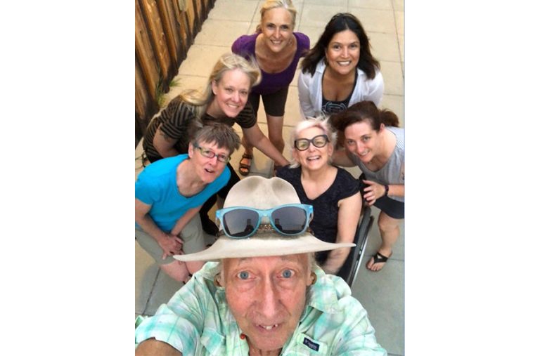 Tomi Hazel Vaarde takes a group selfie. Vaarde is a pioneer in the concept of social forestry.