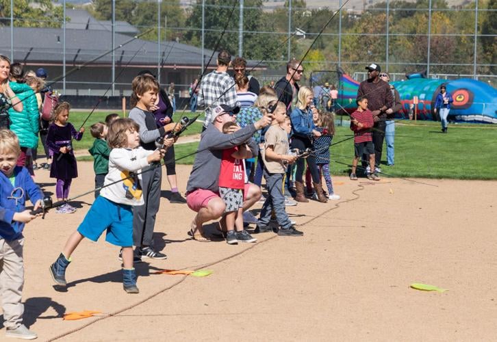 Kids can practice their fishing casts at the North Mountain Park Nature Center during the Bear Creek Salmon Festival. Photo by Bob Palermini