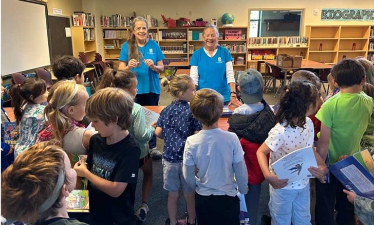 Girls and boys receive free books from the Soroptimist Strong Girls Strong Women (SSGSW) program. Courtesy photo