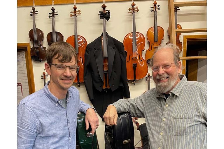 Will Scharen, left, has purchased Bellwood Violin from founder Stephen Bacon, who will continue to work part time at the shop he opened 40 years ago. Julia Sommer photo