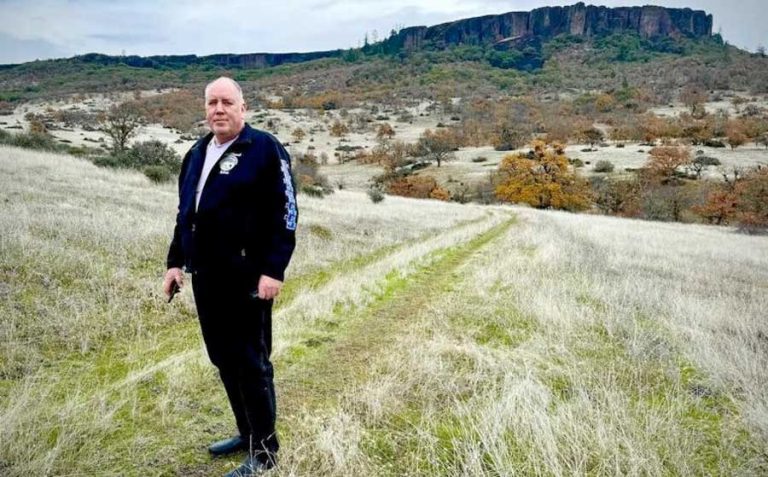 Robert Kentta of the Confederated Tribes of Siletz Indians and the tribal council’s treasurer, stands in part of the tribe’s 2,000-acre purchase of Table Rock property north of Medford. Photo by Matt Hill from Long Rock Strategies