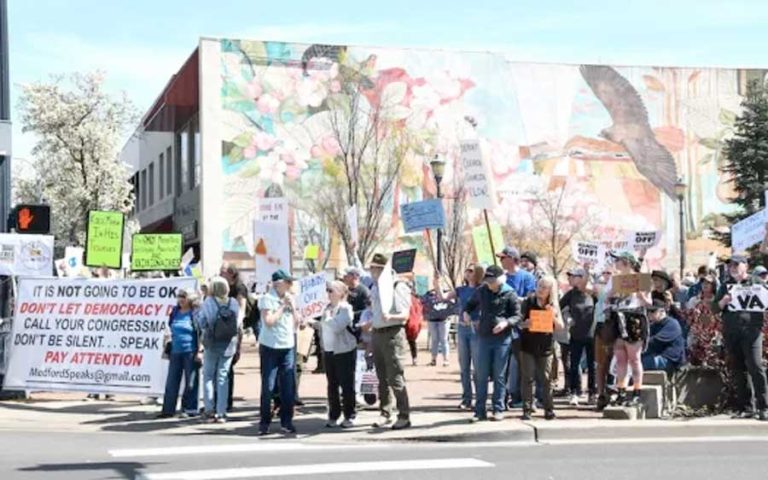 A second protest on Saturday, at downtown Medford’s Vogel Plaza along Central Avenue, boasted more than 1,000 sign holders at the intersection of East Main Street and Central Avenue. Rogue Valley Times photo by Buffy Pollock