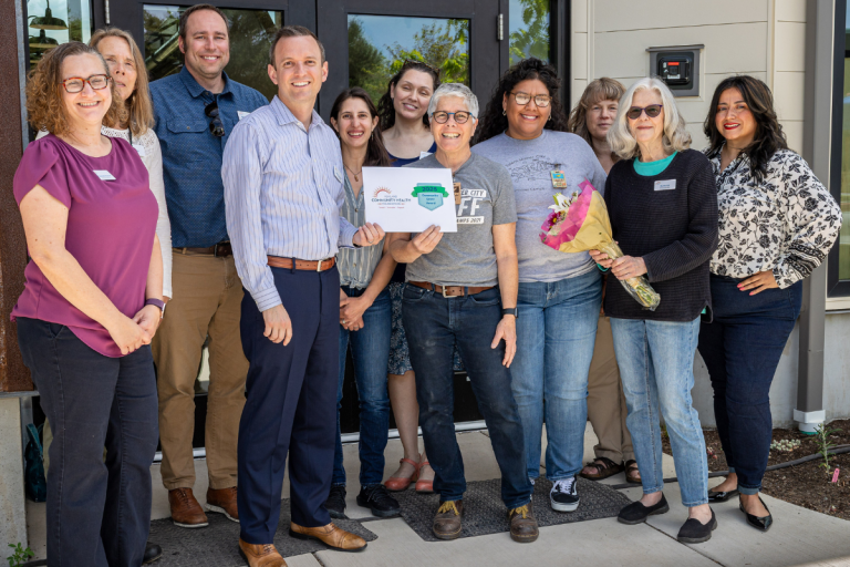 Staff with Talent Maker City pose with a certificate announcing they are a recipient of Ashland Community Health Foundation grant funds. ACHF photo
