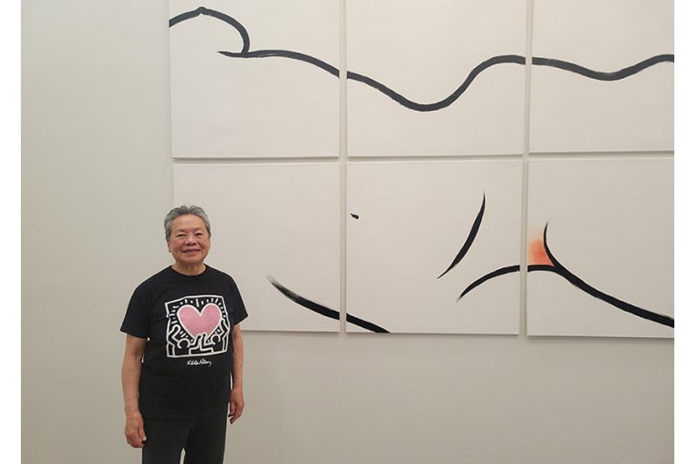 Irene Kai stands beside her mural "Coming Together" at the Langford Art Gallery in Phoenix. Her exhibition runs through June 28. Art Van Kraft photo