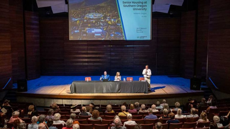 Southern Oregon University General Counsel Rob Patridge (right) kicked off the second of two public presentations where potential development partners for a proposed senior living facility on campus presented their experience and plans. Ashland.news photo by Bob Palermini
