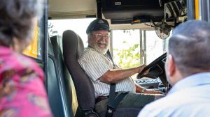 Ashland bus driver Stefan Windroth talks with Interim Principal Francisco Atanes and Superintendent Joseph Hattrick after dropping off students Tuesday. Ashland.news photo by Bob Palermini