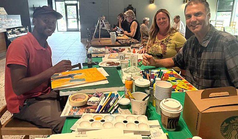 From left, Gatore Mukarhinda, Denise Gerkey and Steve French at Starbucks. Debora Gordon photo for Ashland.news